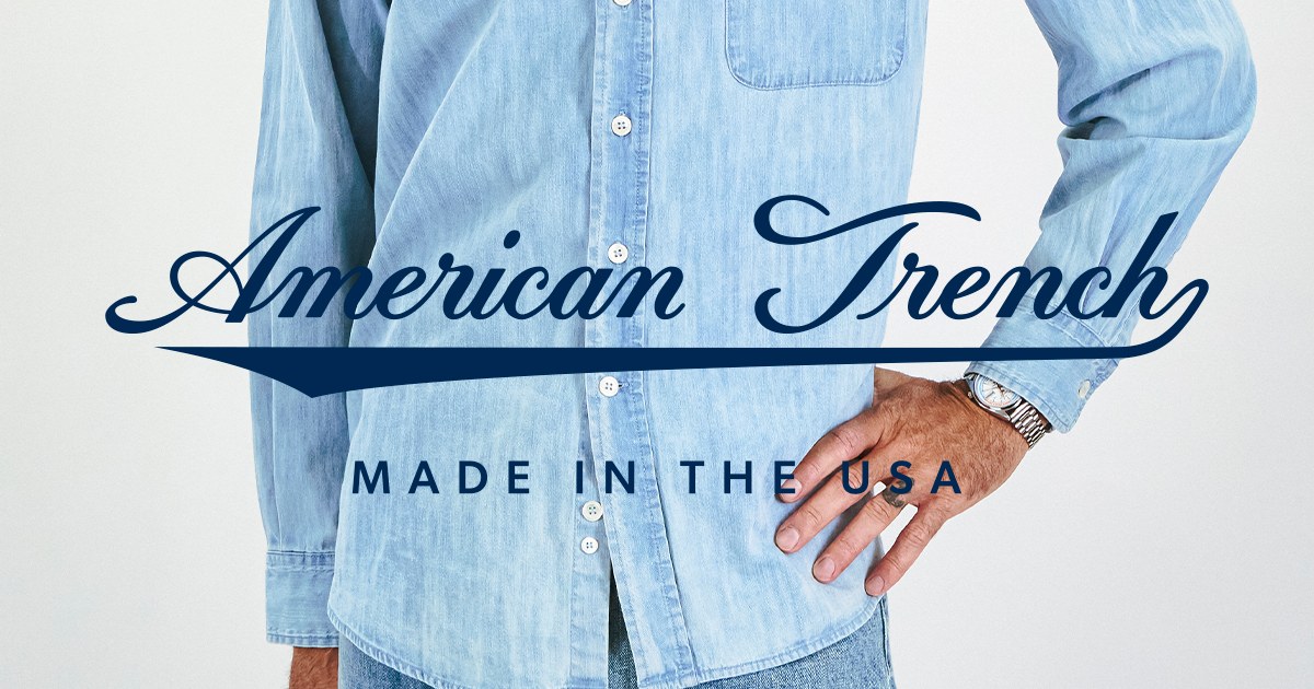 American Trench script logo over a light-wash denim shirt, Made in the USA